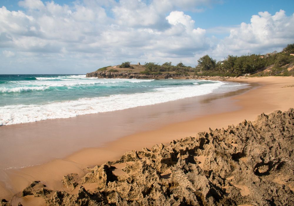 Very rustic and empty beach at the Indian Ocean in the coastal town Praia do Tofo in Inhambanae, Mozambique