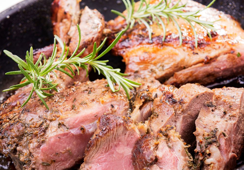 Rustic roast Yorkshire lamb with pan juices and rosemary