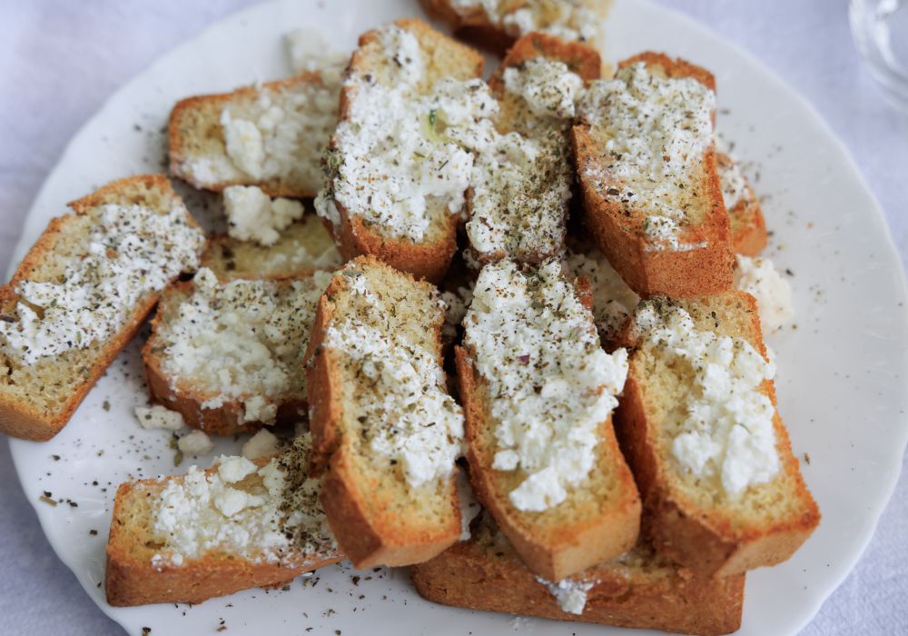 albanian food bread with cheese on top of it