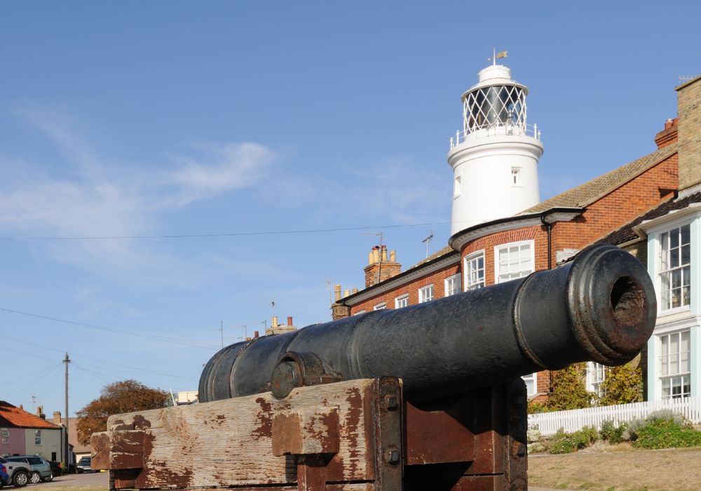 Southwold cannon and lighthouse in the UK