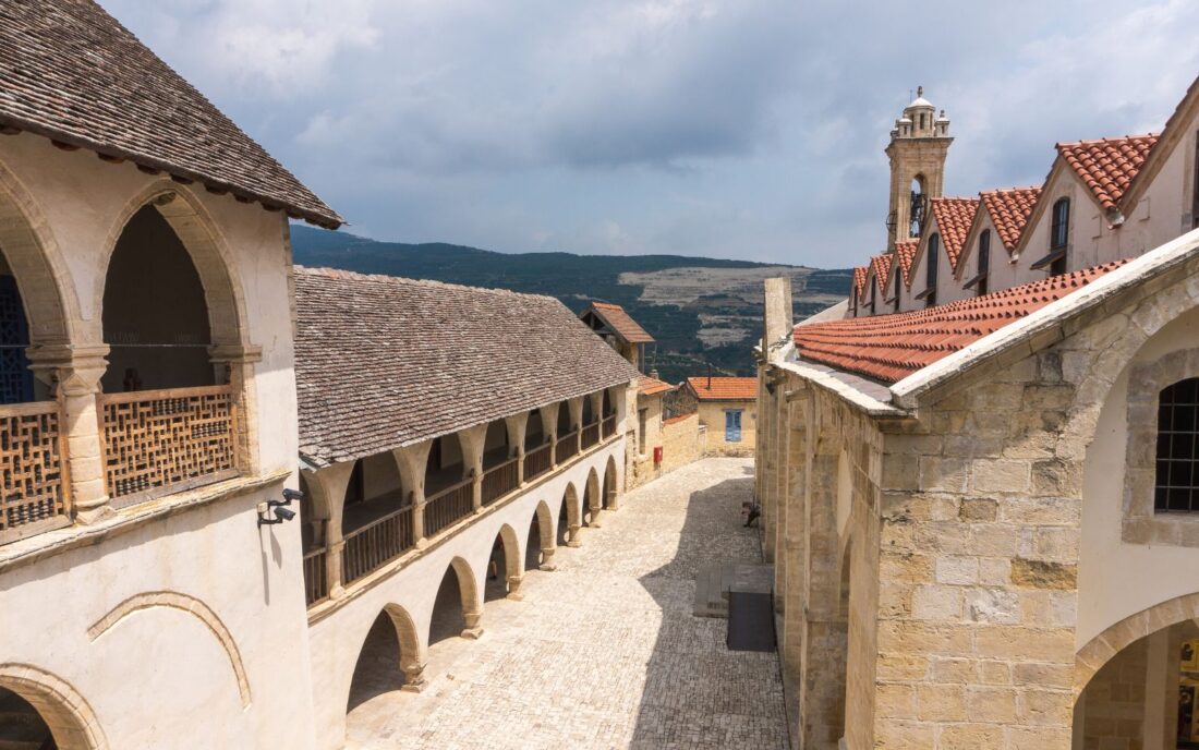 View of Timios Stavros Monastery outdoor porches in town of Omodos