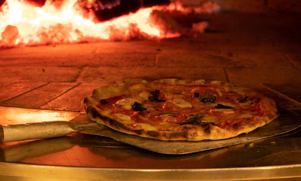 Delicious Pizza in Red Lodge Montana going into the wood fired oven at a restaurant in Red Lodge