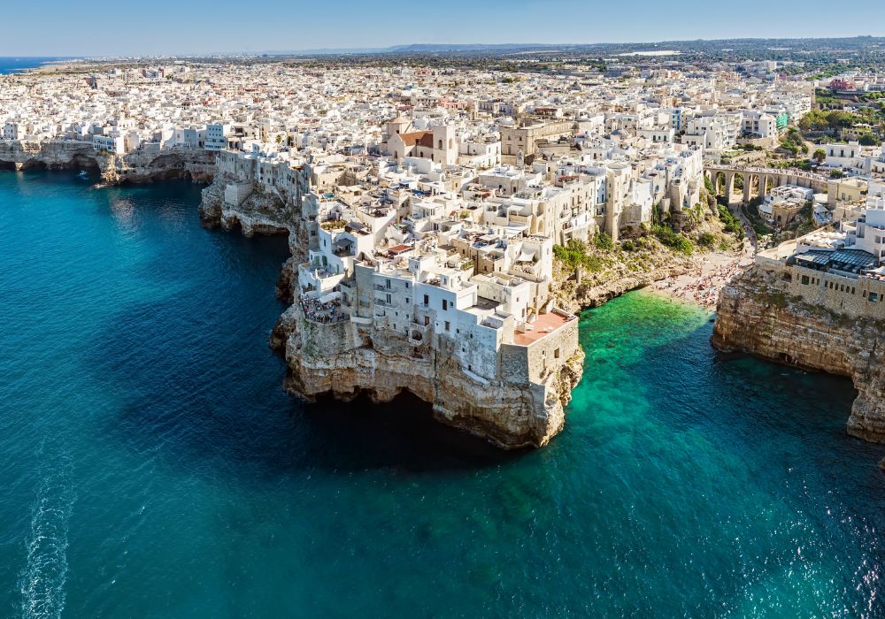 Polignano a Mare in puglia italy. aerial view of the city with the sea