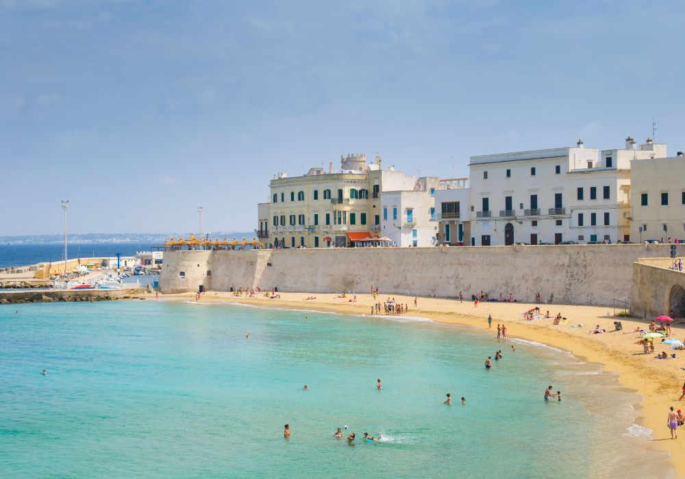 gallipoli beach in italy people swimming in the sun