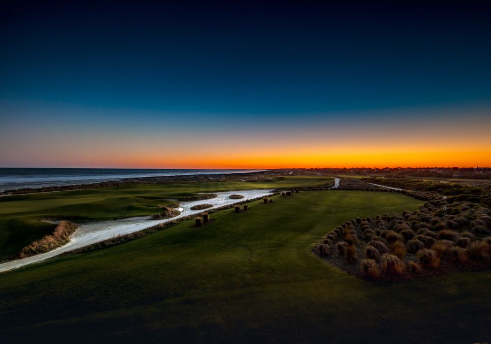 golf course at sunset with the ocean on kiawah island