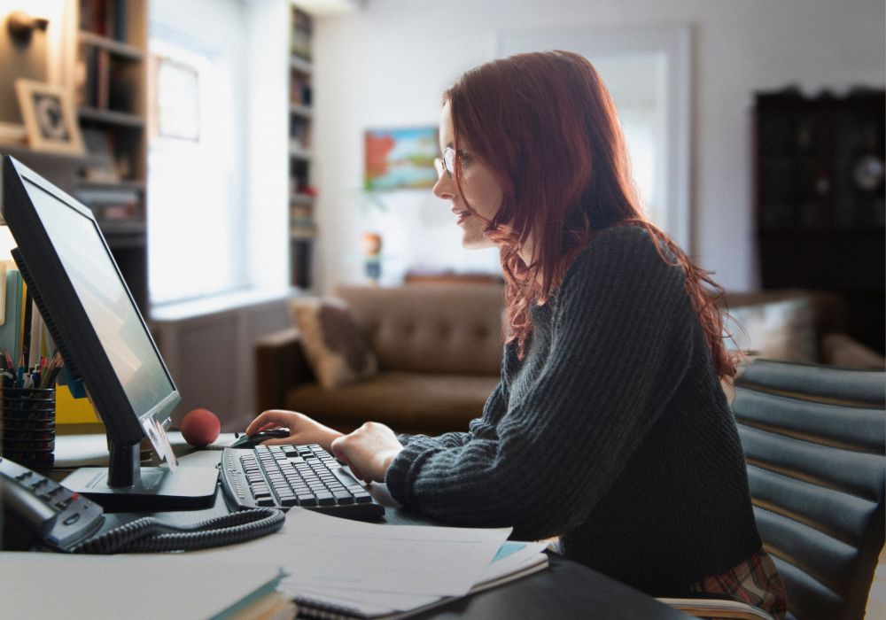 A person working from home using a computer.