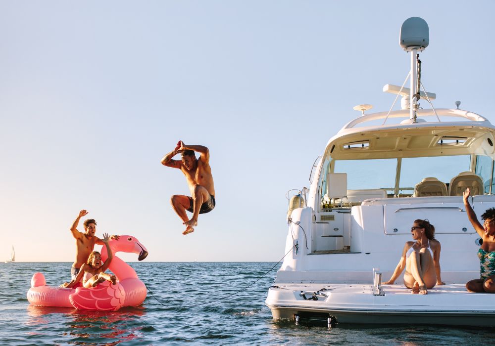 Young people having fun during party on a private boat.