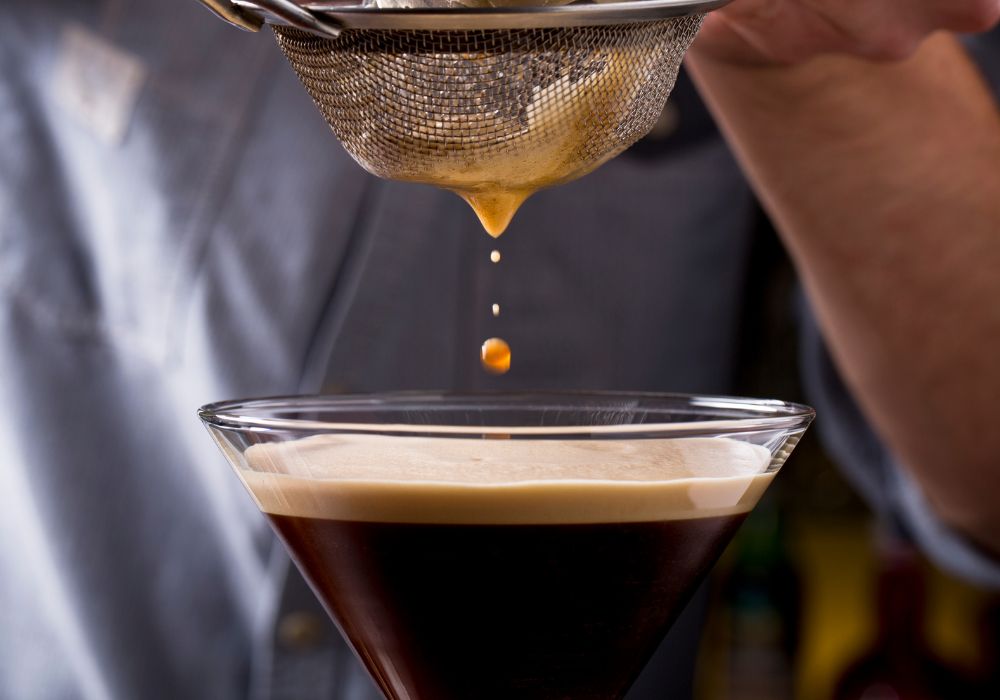 bartender preparing classic espresso Martini cocktail