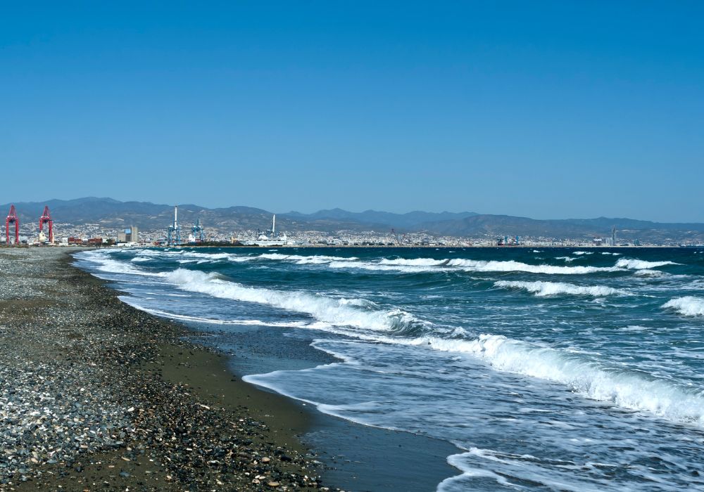 lady's mile beach in limassol with waves and pebble sand