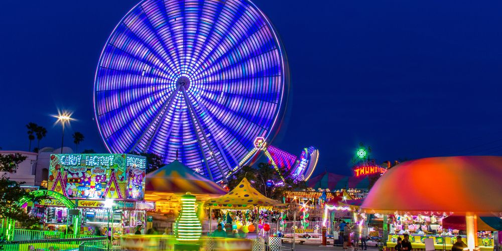 Night view of the spinning ferris wheel at the Elitch Gardens Theme Park in Denver