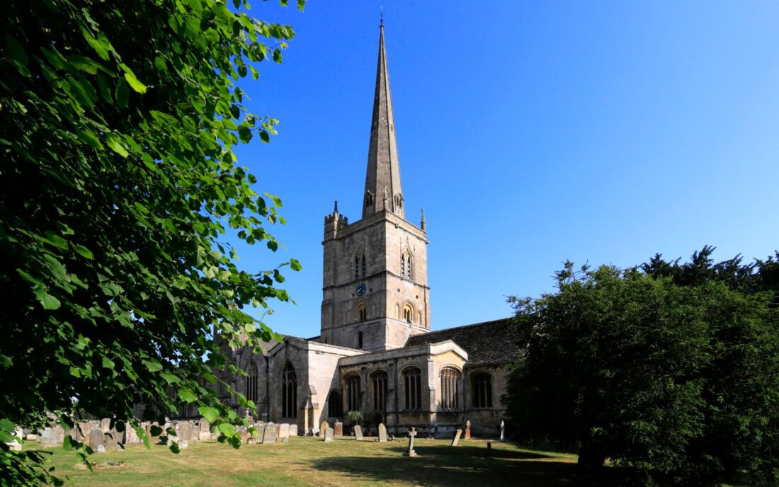 Summertime at St. John's Parish Church in Burford.