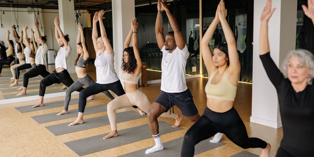 A group of people doing yoga together