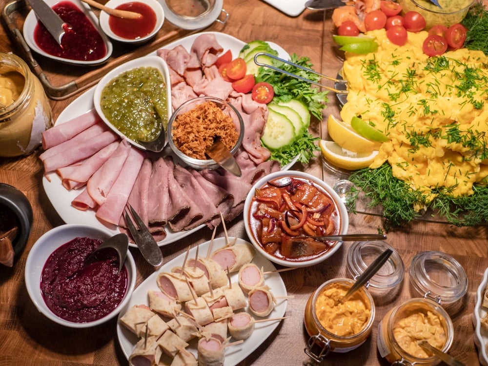 A huge Christmas meal in Copenhagen with sliced meat and many sauces