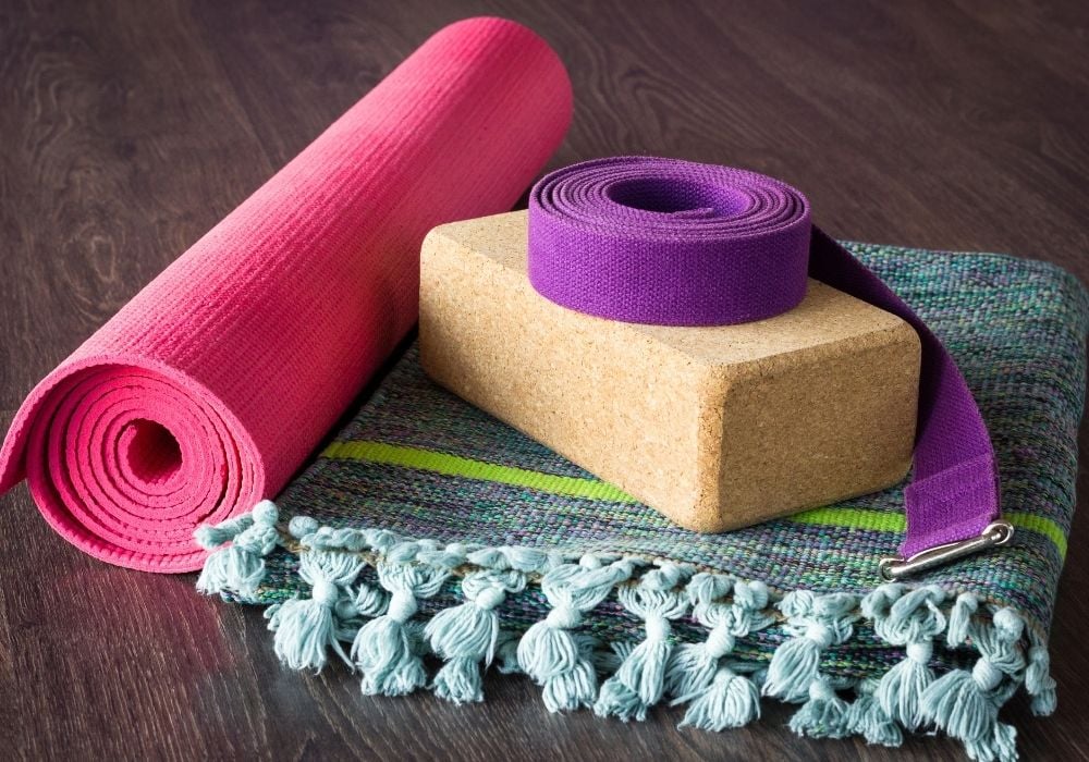 Yoga mat, a block, a strap, and a blanket: equipment for being a yoga teacher