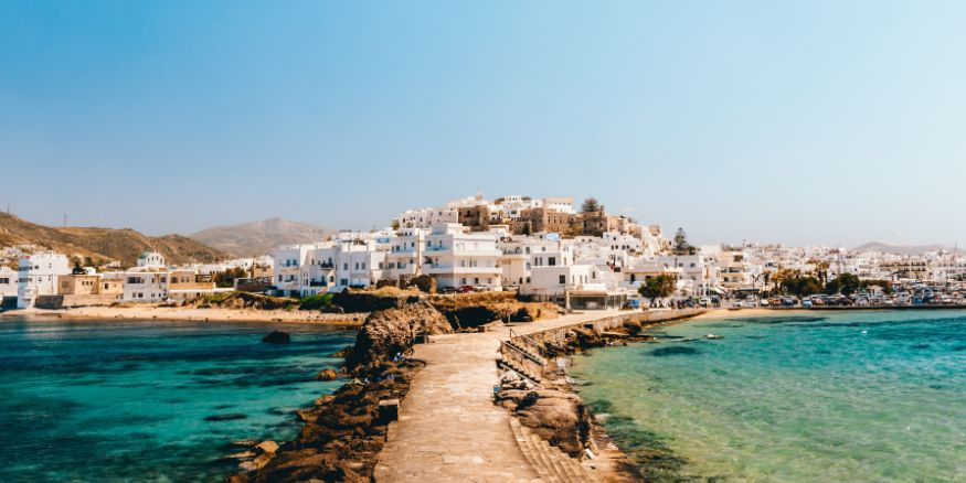 Clear water, beaches and village in Naxos