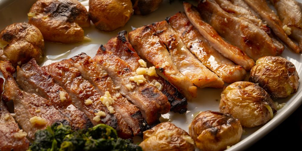 Slices of porco preto cooked to perfection