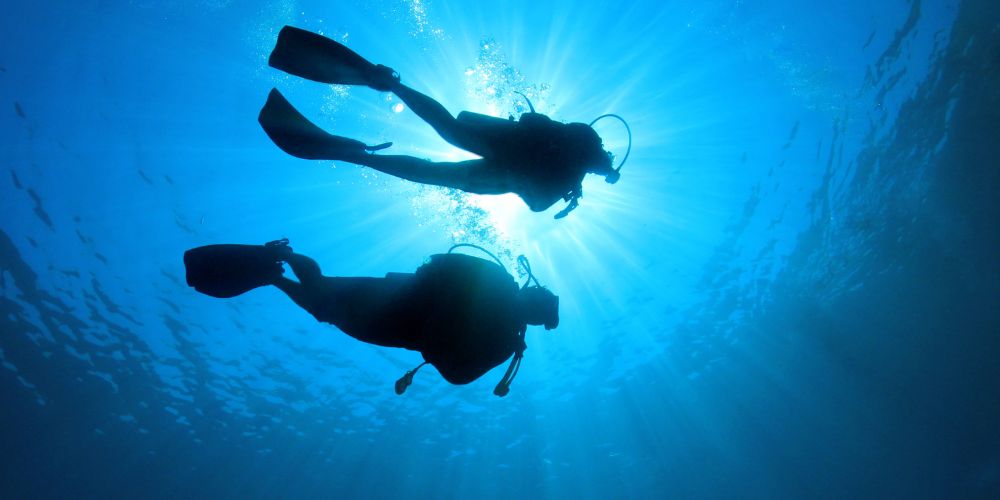 become a scuba diving instructor and get paid to travel