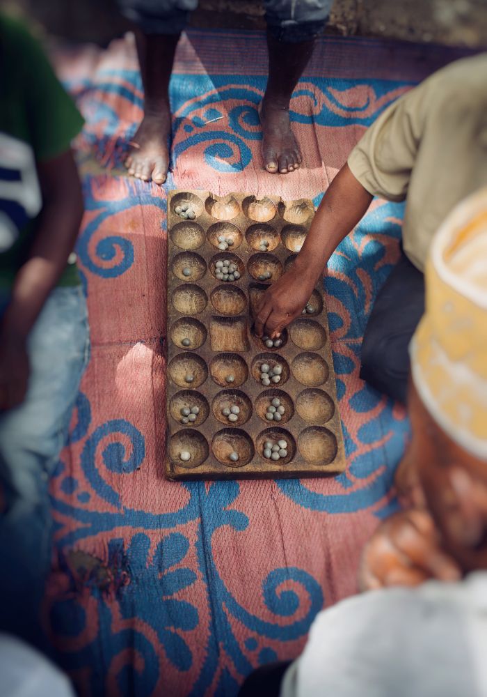 men playing bao game in kenya