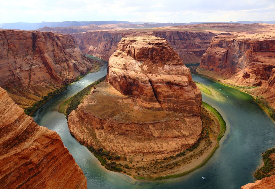 best things to do in the grand canyon rock with water around it