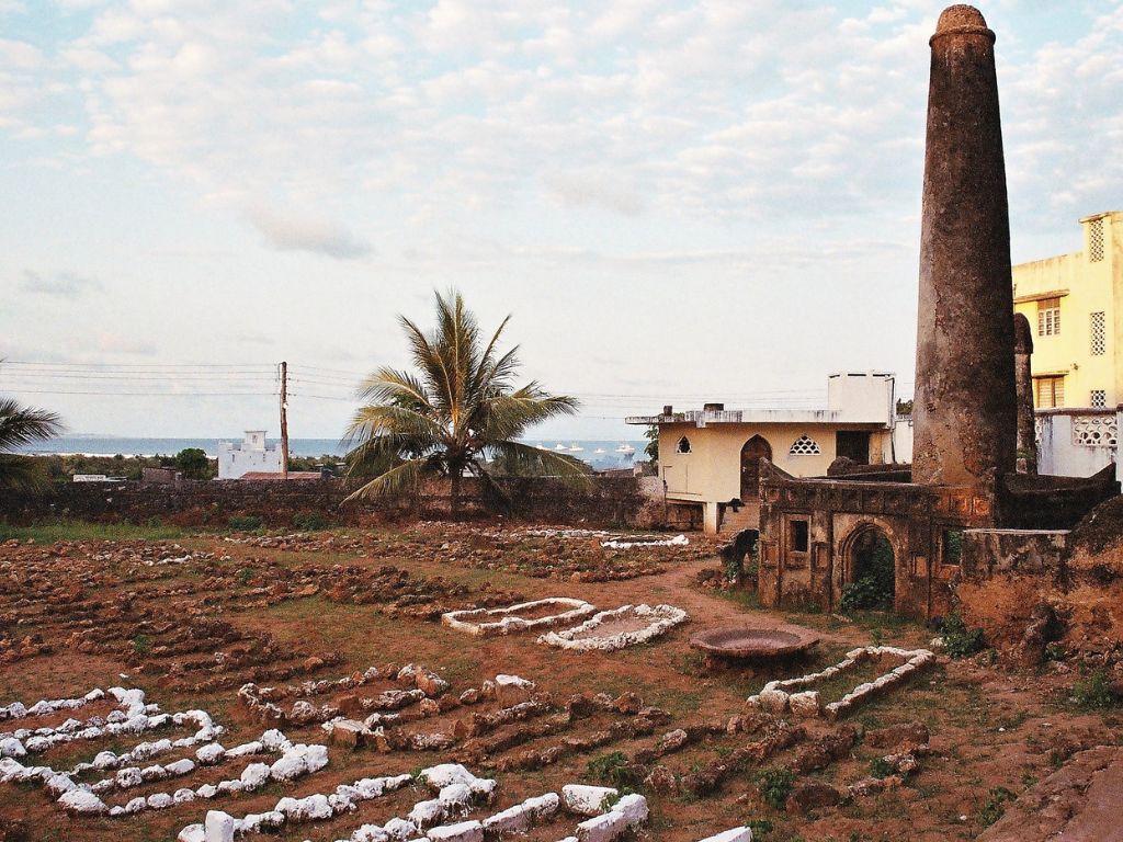 stone pillar with old houses in malindi kenya