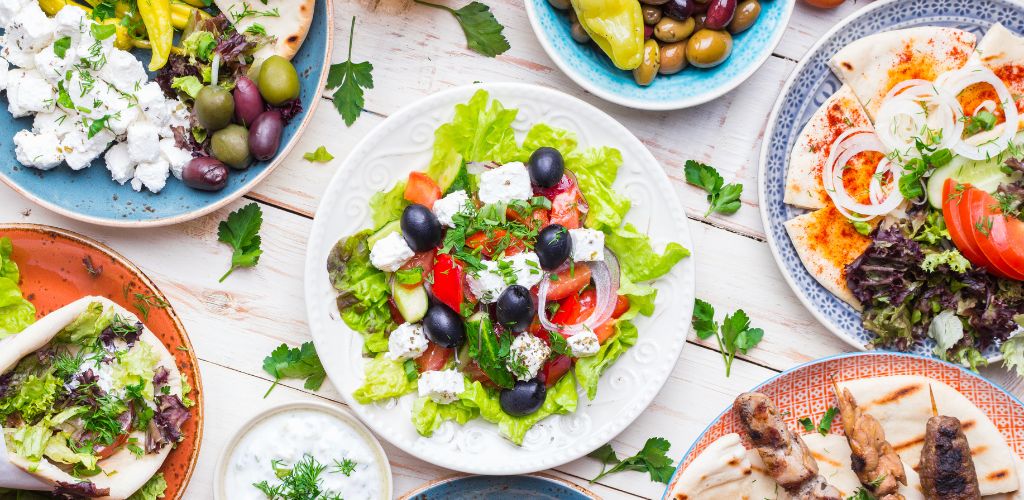 a Greek Dish having fruits and vegetables