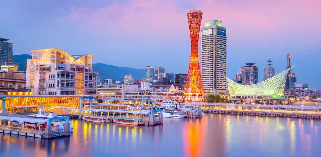 kobe cityscape lit up at sunset