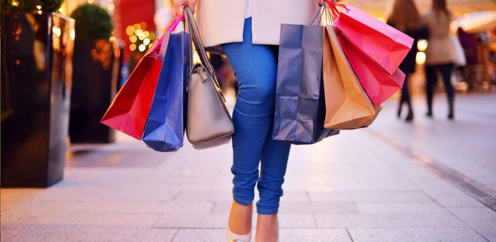 woman carrying shopping bags