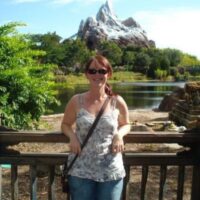 Nicola Curtis Travelling With Mountains Behind Her