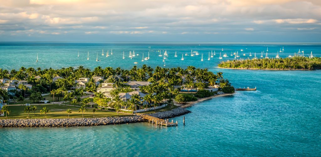 Panoramic sunrise landscape view of the small islands sunset key and Wisteria Island of the island of key West, Florida Keys. 