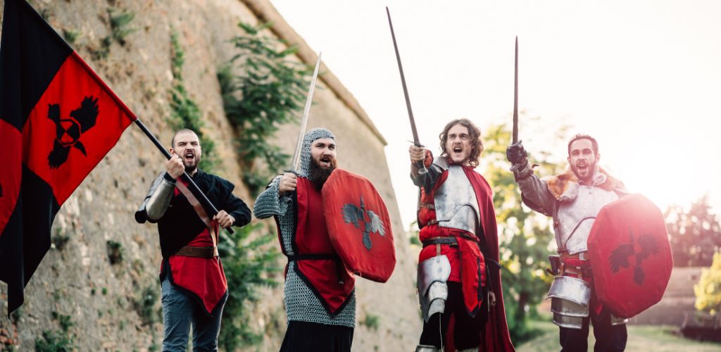 Medieval times with FOUR knights going to battle.