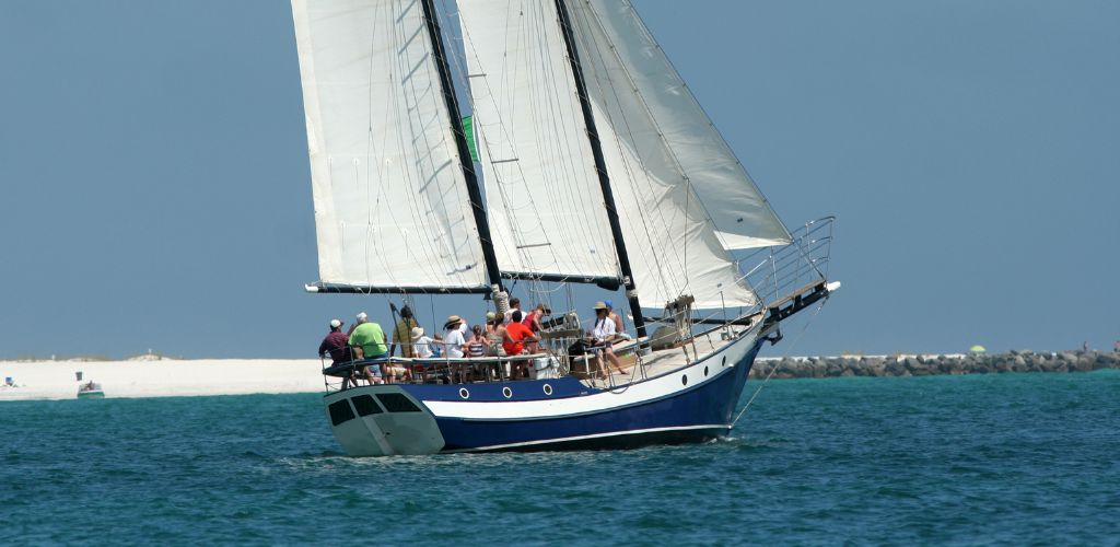 Tourist sailing cruise in the middle of the sea. 
