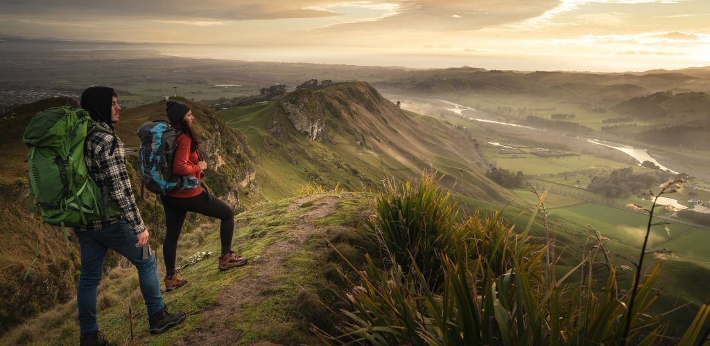 2 Hikers reached the top of the mountain with the best scenery
