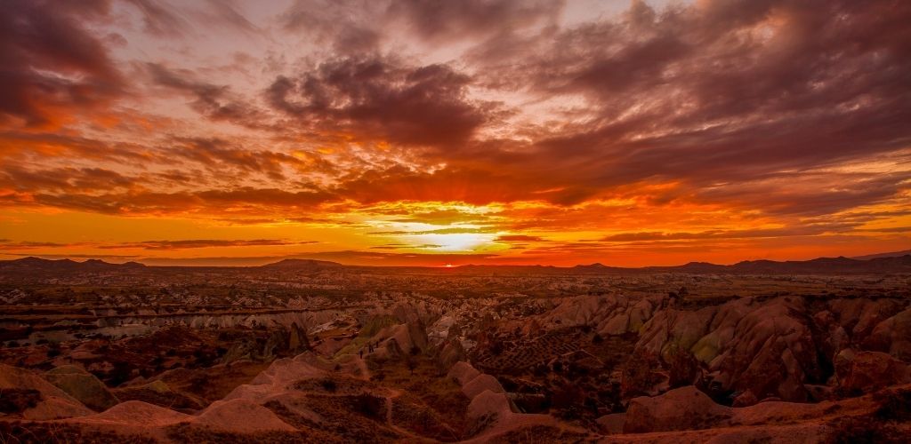 A view of rock mountain in the sunset view. 