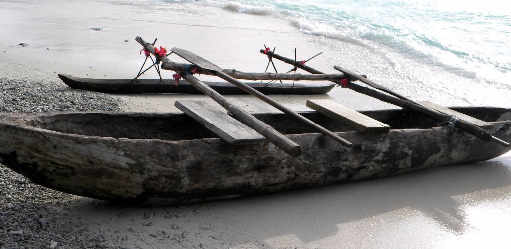 dugouts boat fishing beach