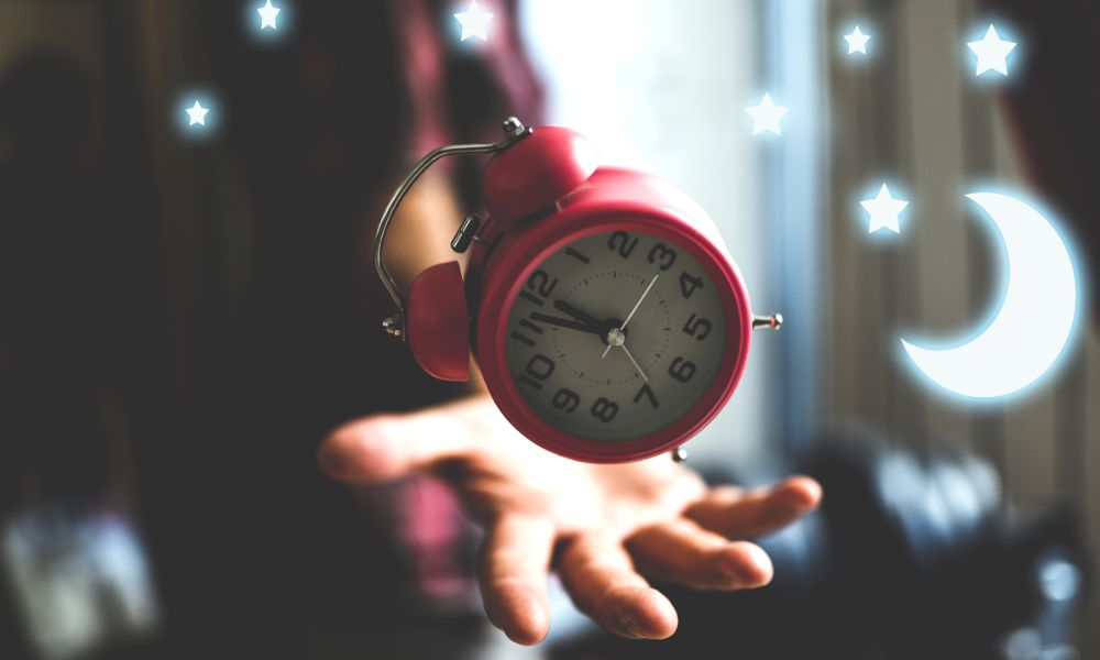 A magic, mystical alarm clock hovering over a man's hand