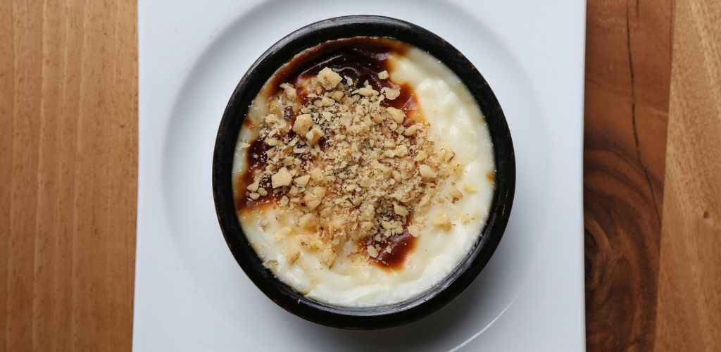 It's Turkish style baked rice pudding aka Sutlac in turkey. 