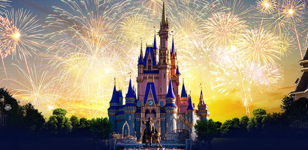 On the front, there is a Walt Disney World castle and a statue, with fireworks in the background. 
