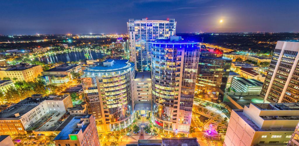 Orlando, Florida, USA  aerial cityscape towards Lake Eola at dusk. 