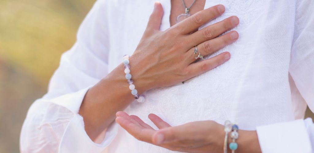 A woman in a white shirt is demonstrating the Self-Acceptance Concept.