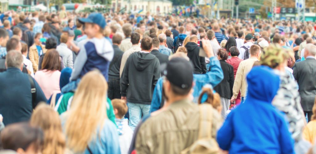 Crowded of people walking on the city street. 