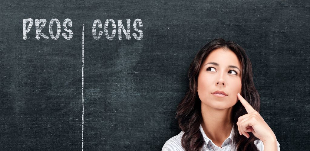 A  woman making a decision and a chalk board on her background written a Pros and Cons.